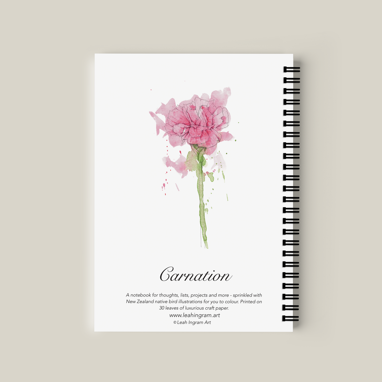 Notebook with pink flower illustration on a beige background