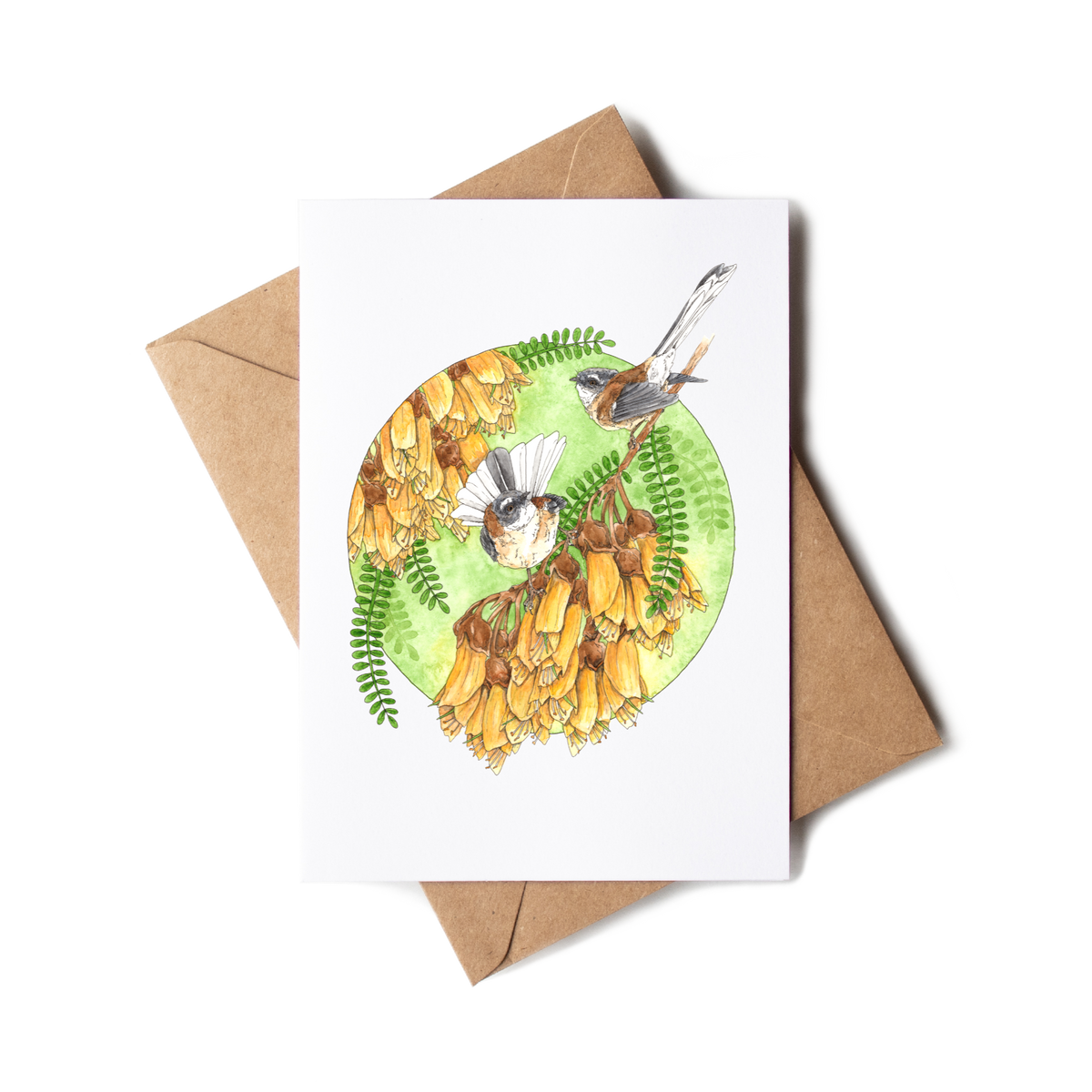 Greeting card with nature-themed design and envelope on a white background