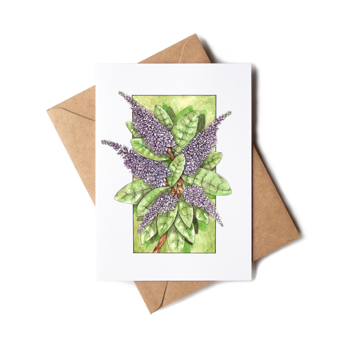 Greeting card with lavender design and brown envelope on white background