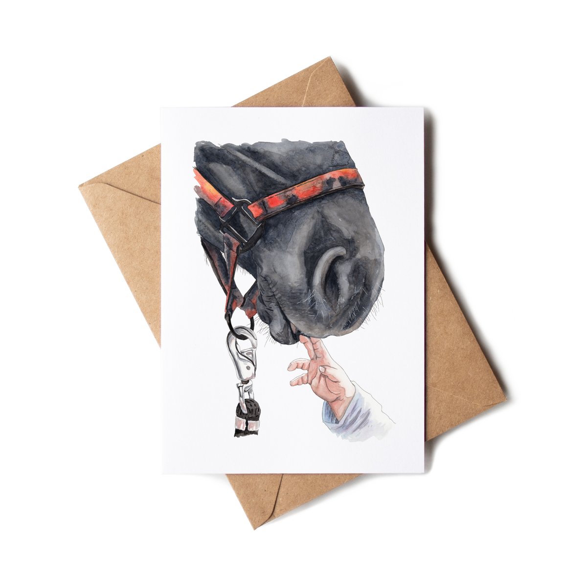 Greeting card with a horse's head and hand reaching through a bridle, on a white background.