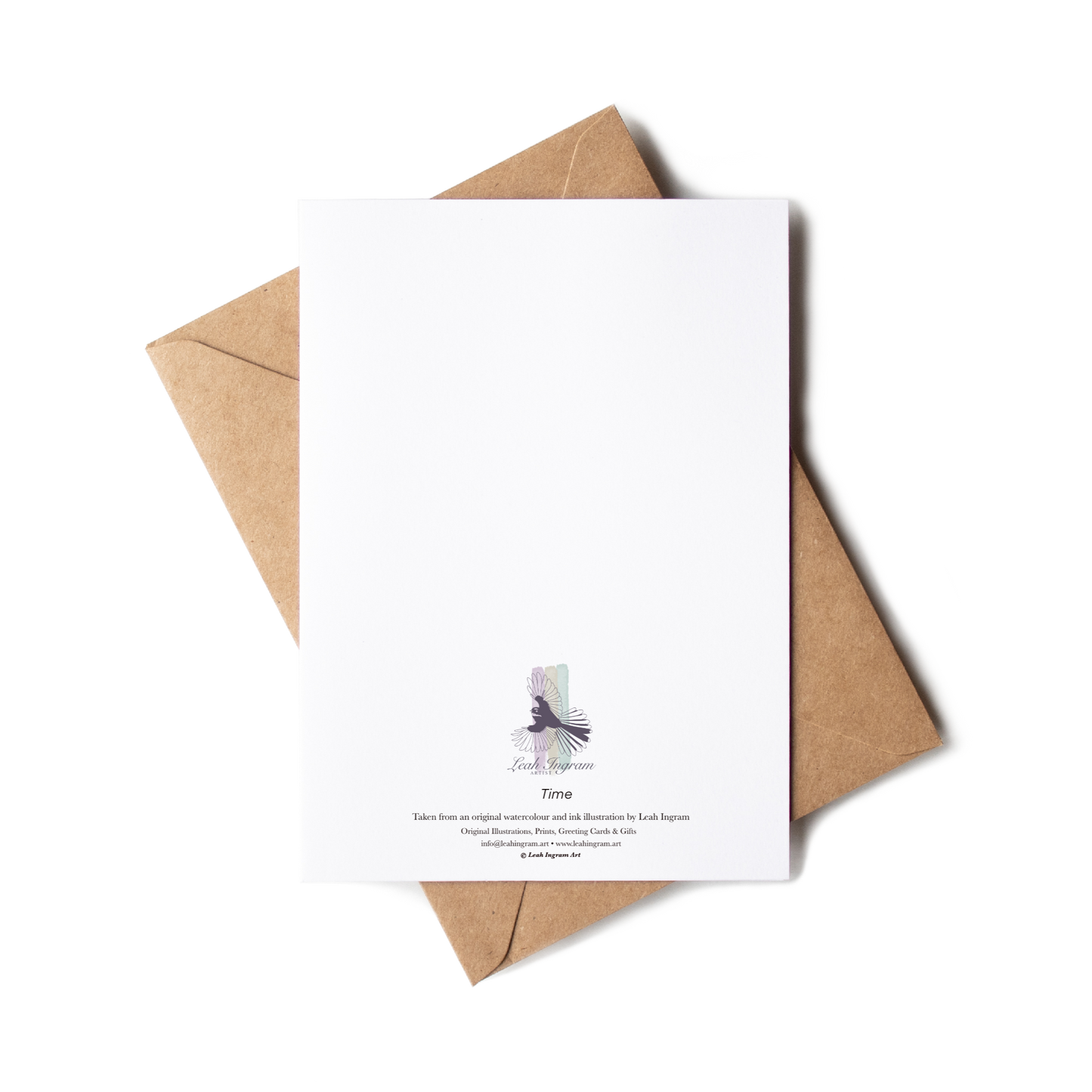 White card with a purple graphic and text on a brown envelope against a white background