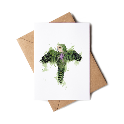 Greeting card with a green parrot illustration on a white background, accompanied by a brown envelope.