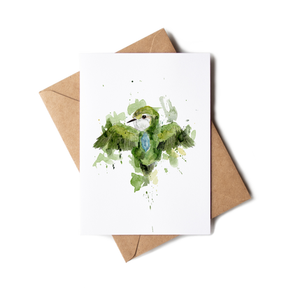 Greeting card with a green bird illustration on a white background, accompanied by a brown envelope.