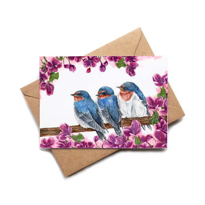 Card with blue birds and pink flowers on a white background