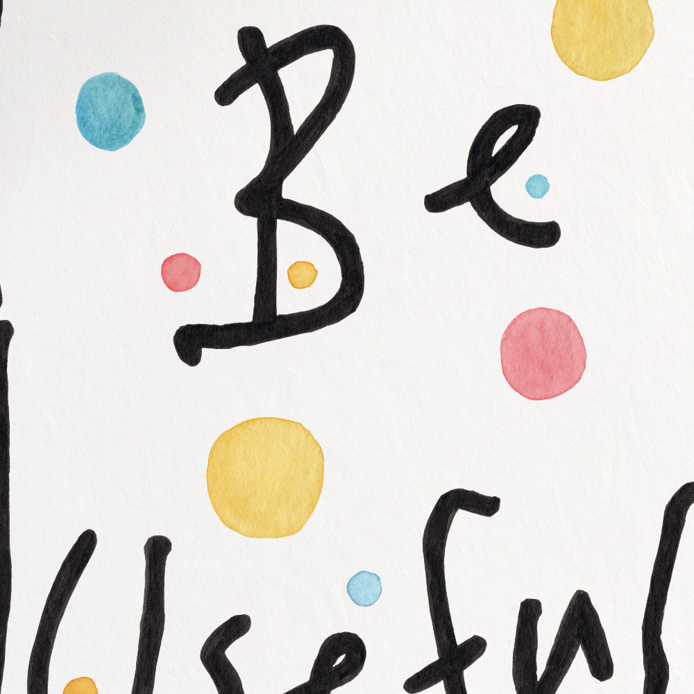 Motivational poster with 'Be Useful' text and colorful dots on a white background