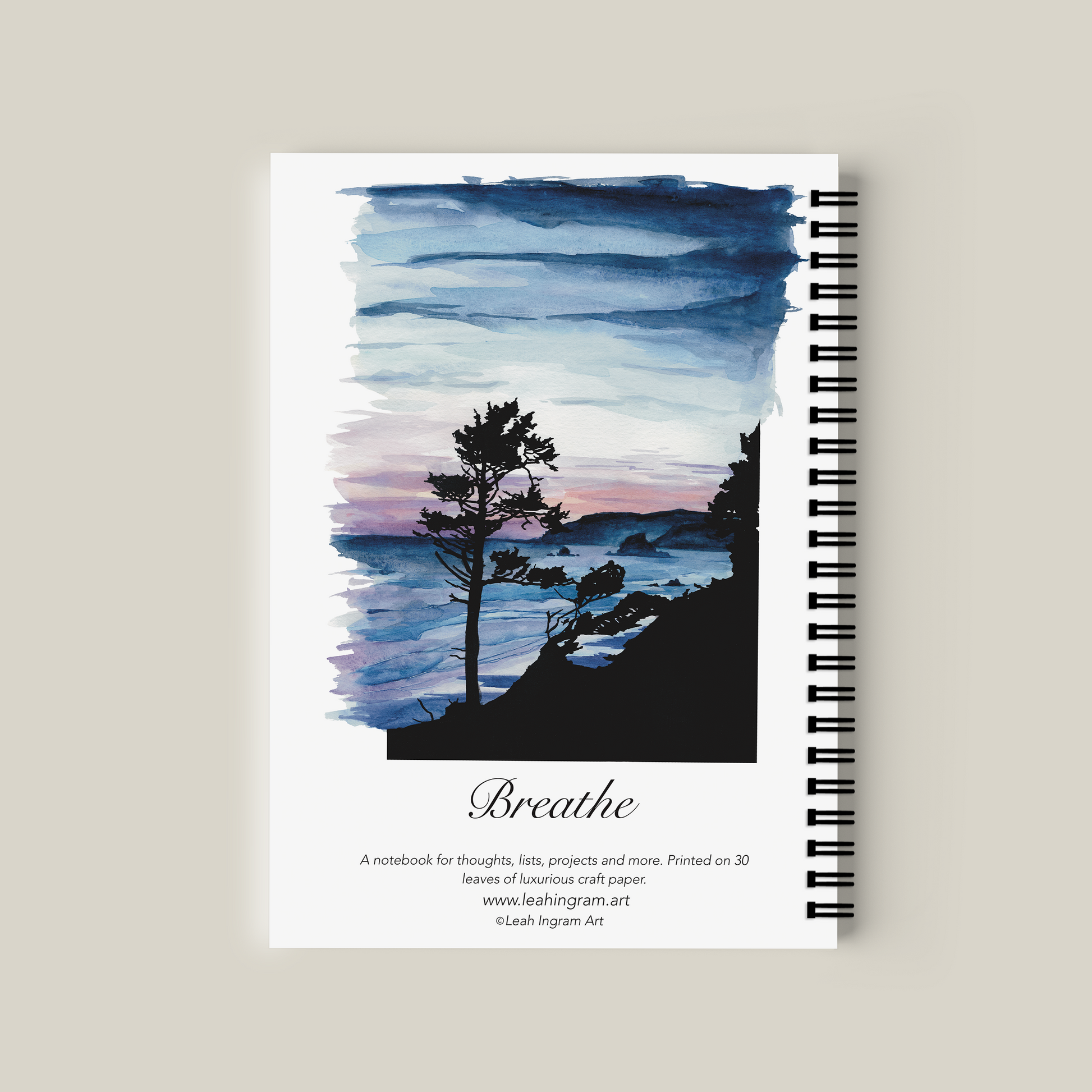 Notebook with a tree silhouette design on a beige background