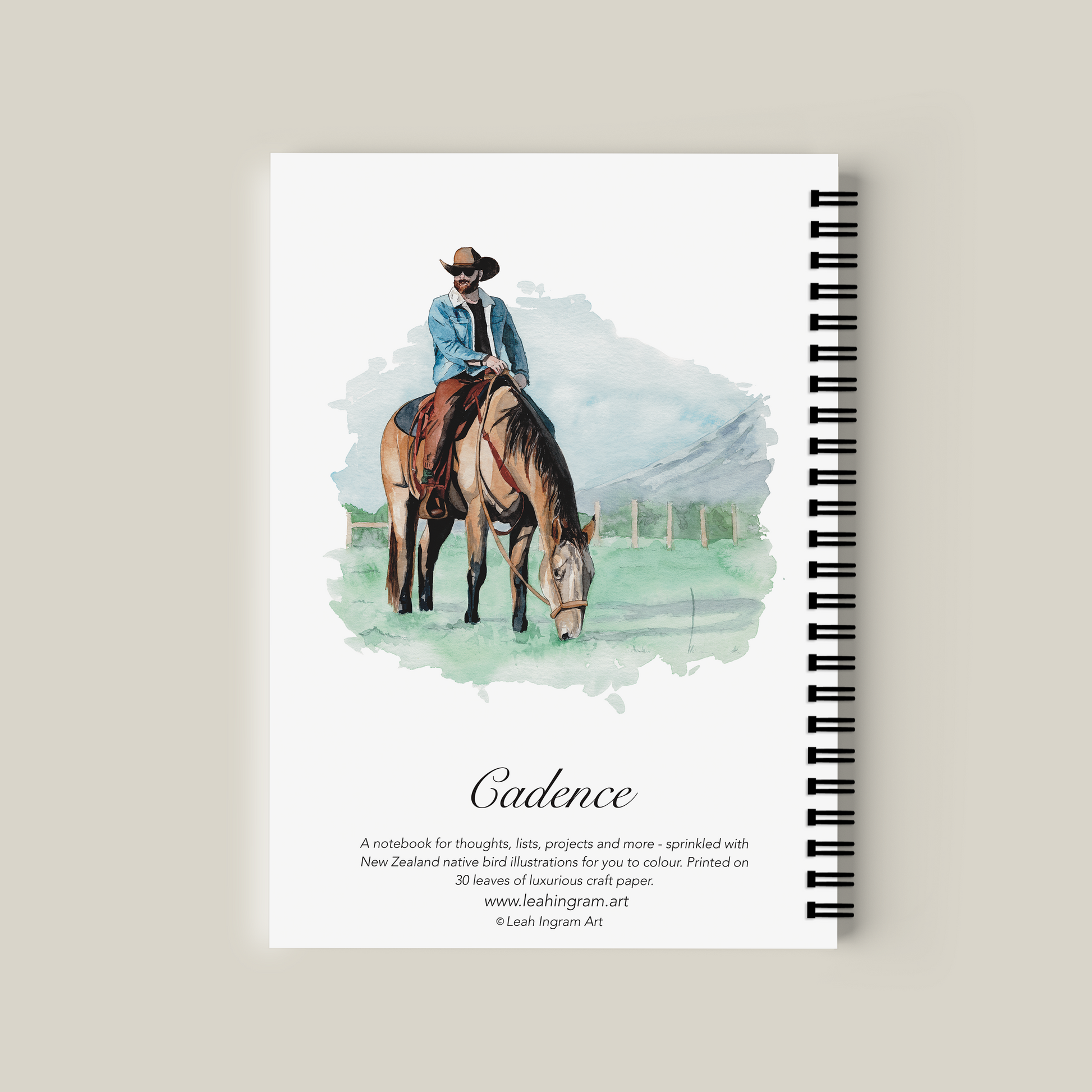 Notebook with a cover illustration of a person on a horse, titled 'Cadence'.