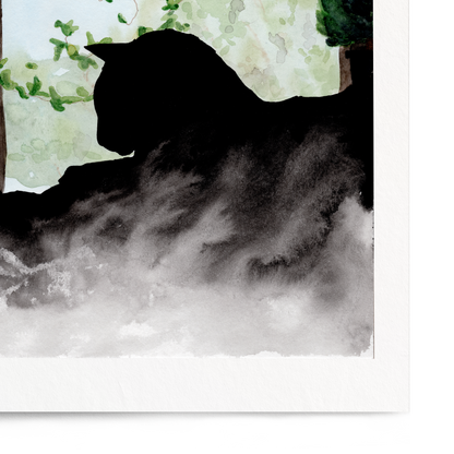 Framed artwork of a silhouette of a cat by a window with greenery