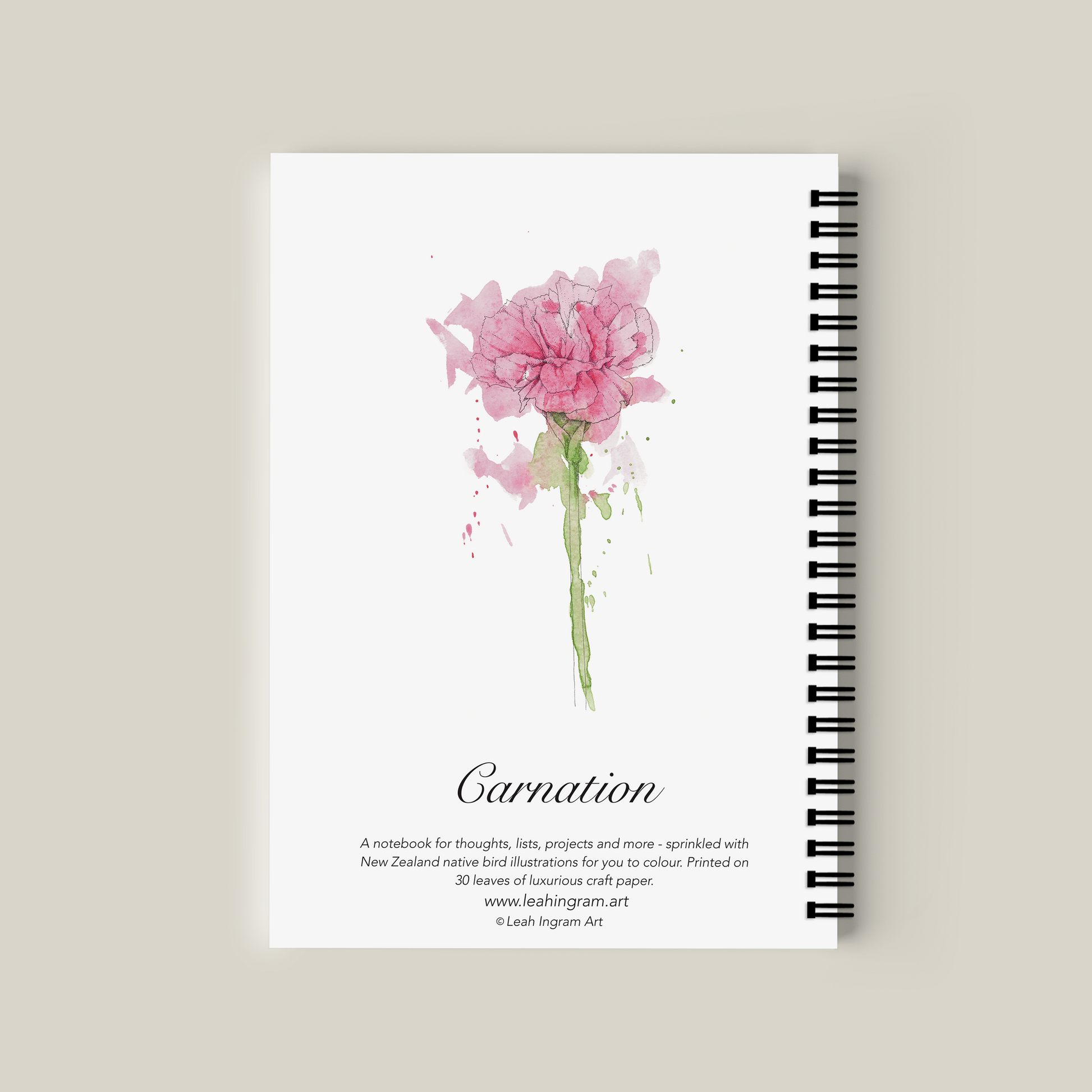 Notebook with pink flower illustration on a beige background