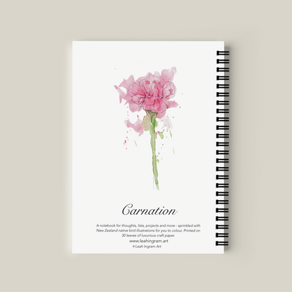 Notebook with pink flower illustration on a beige background