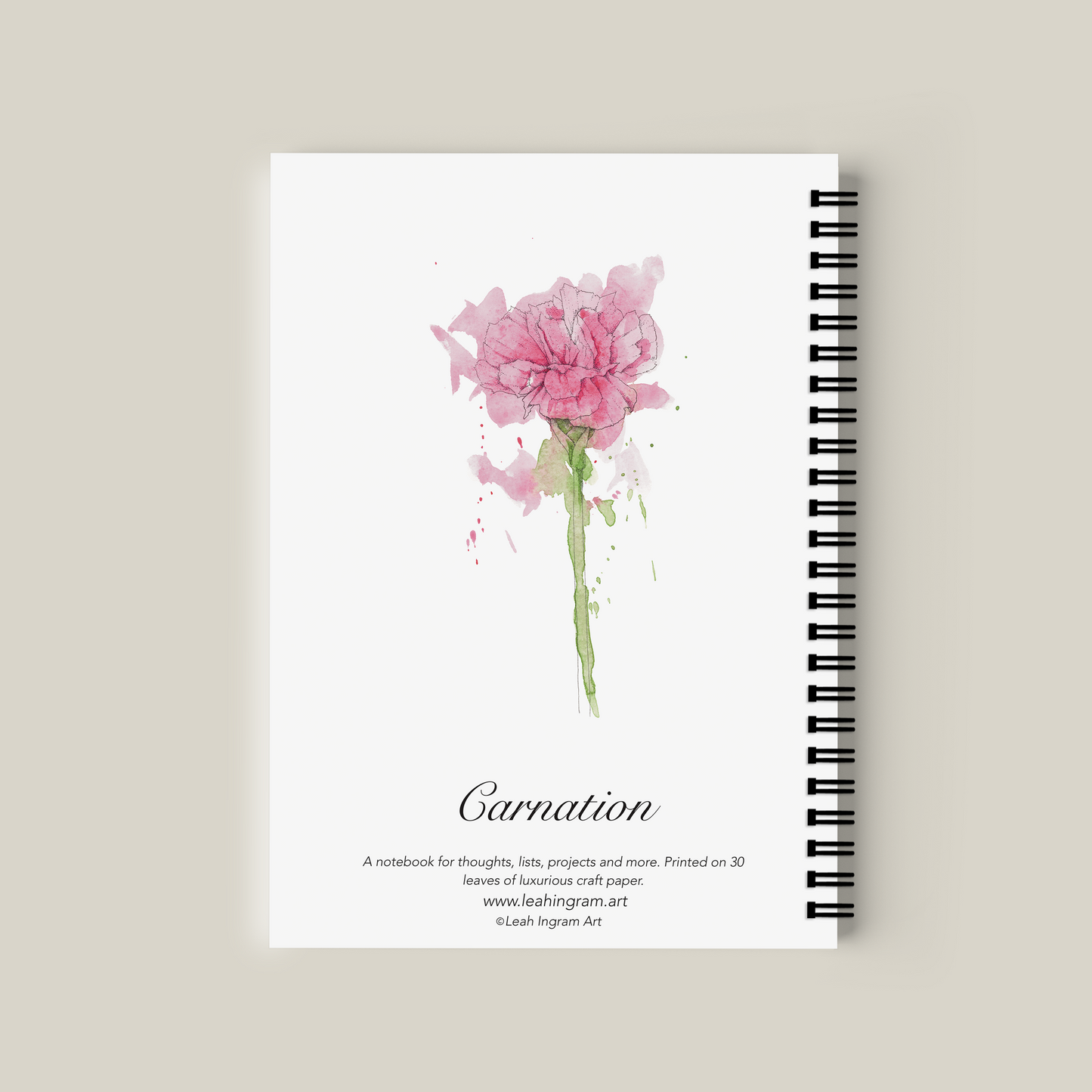 Notebook with pink carnation design on a beige background
