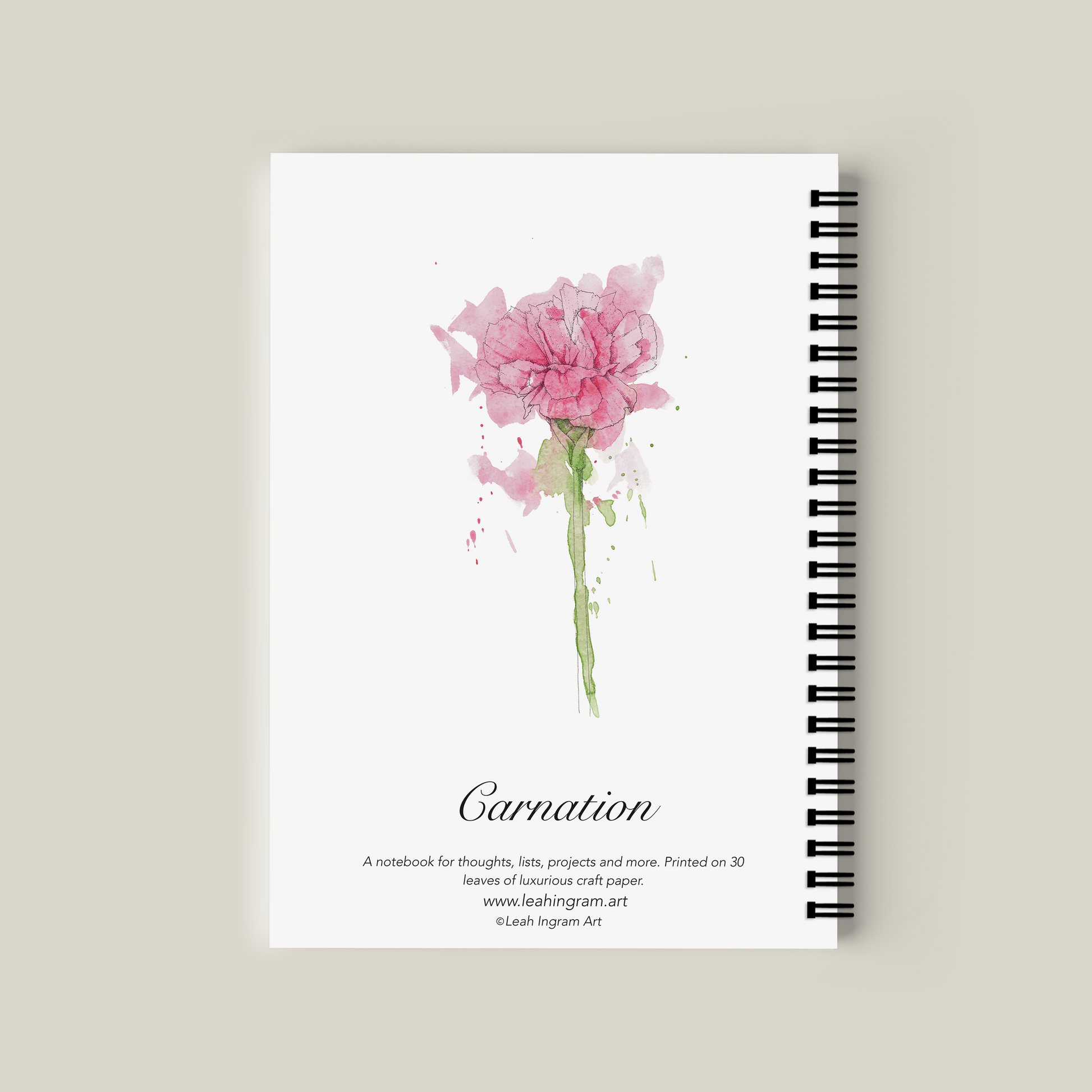 Notebook with pink carnation design on a beige background