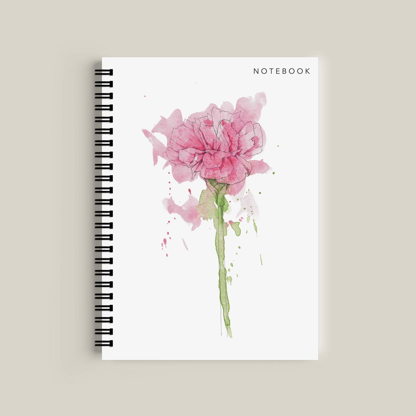 Notebook with a pink flower design on a beige background
