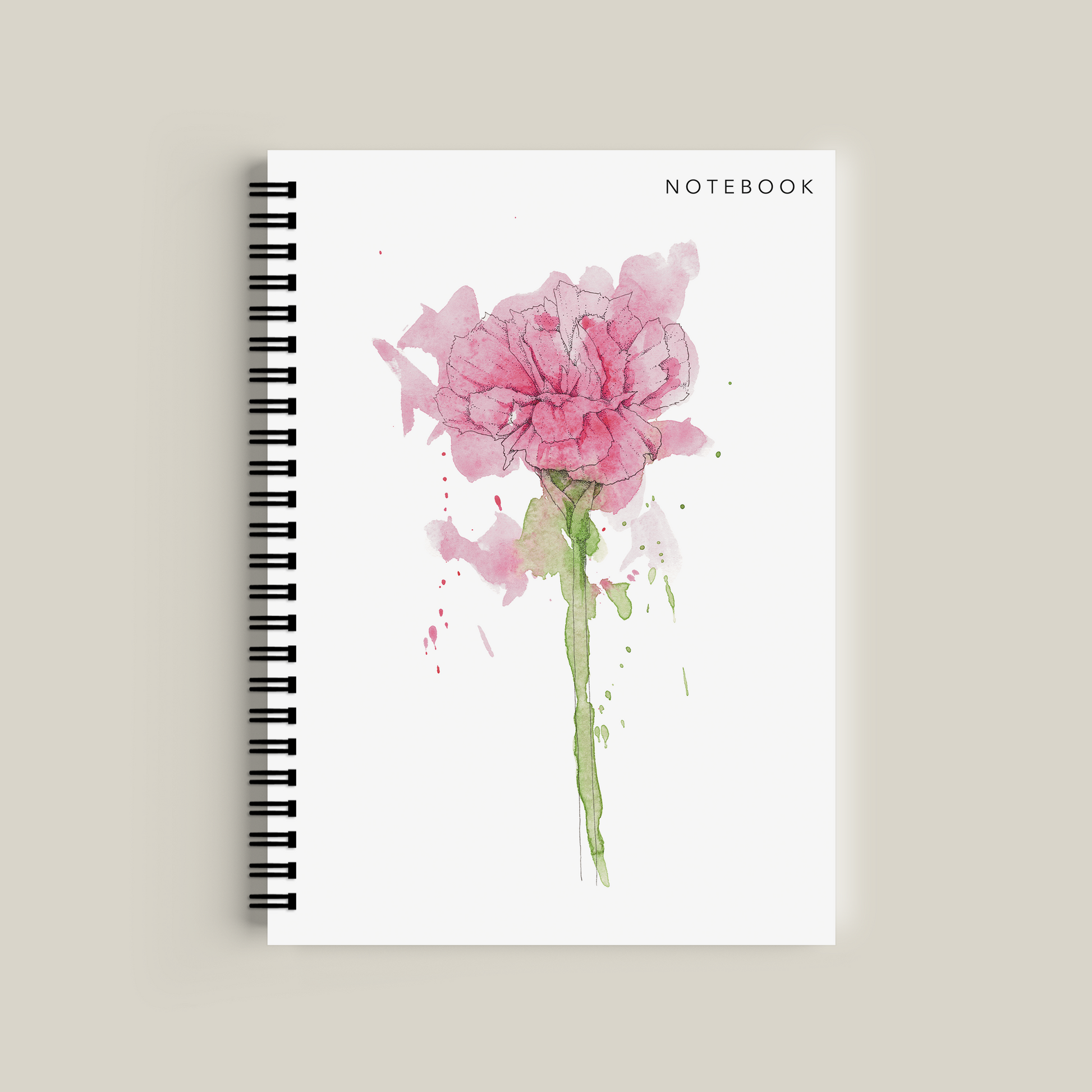 Notebook with a pink flower design on a beige background