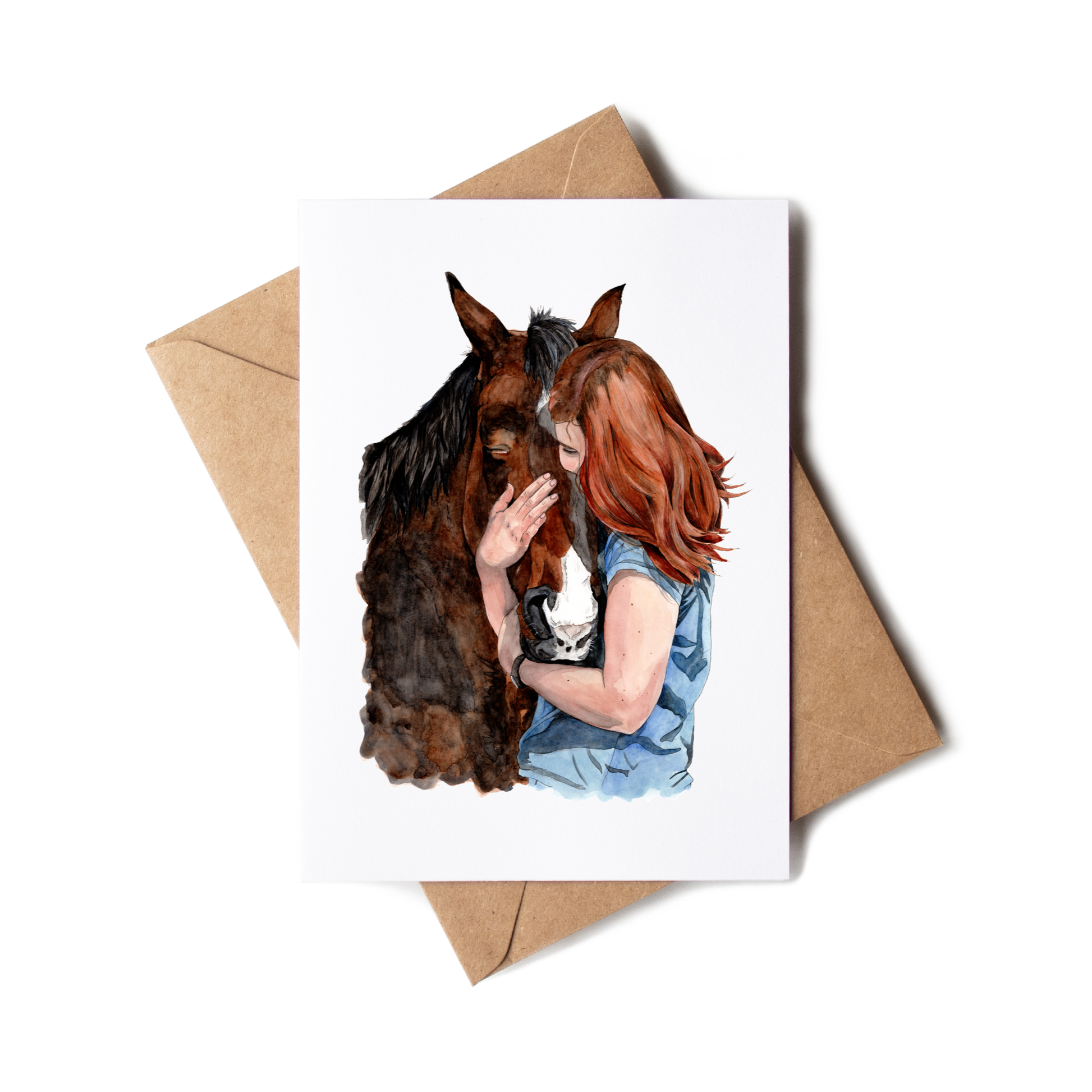 Card with a woman hugging a horse and a brown envelope on a white background