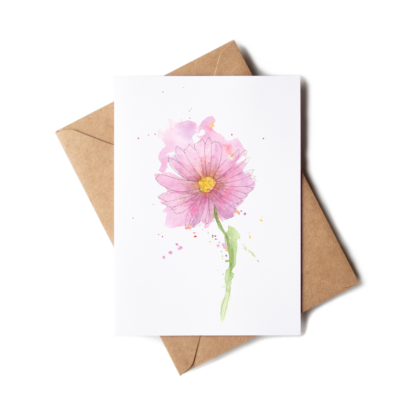 Greeting card with a pink flower illustration on a white background, accompanied by a brown envelope.