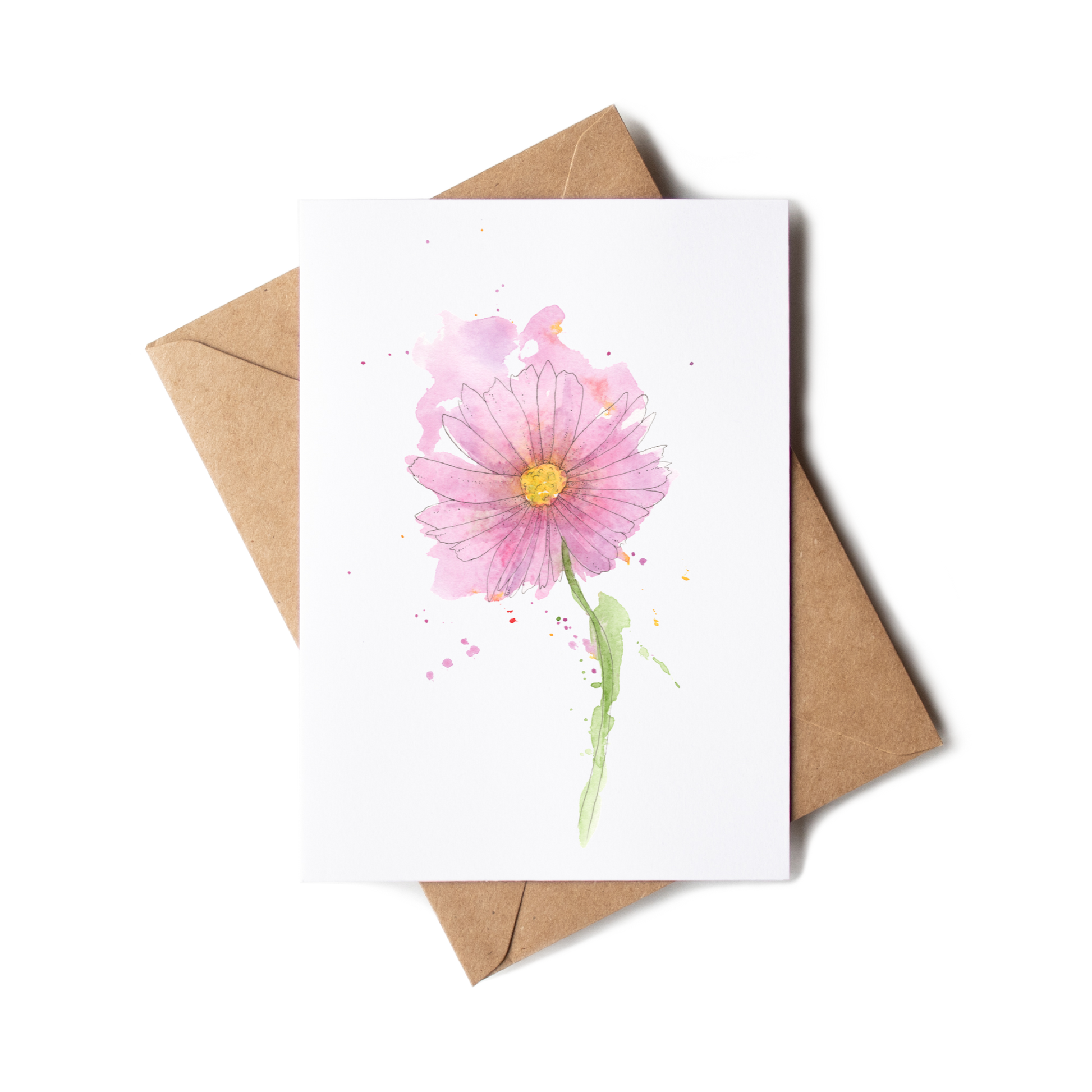 Greeting card with a pink flower illustration on a white background, accompanied by a brown envelope.