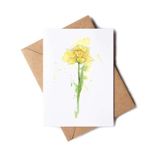 Greeting card with yellow flower design and brown envelope on white background