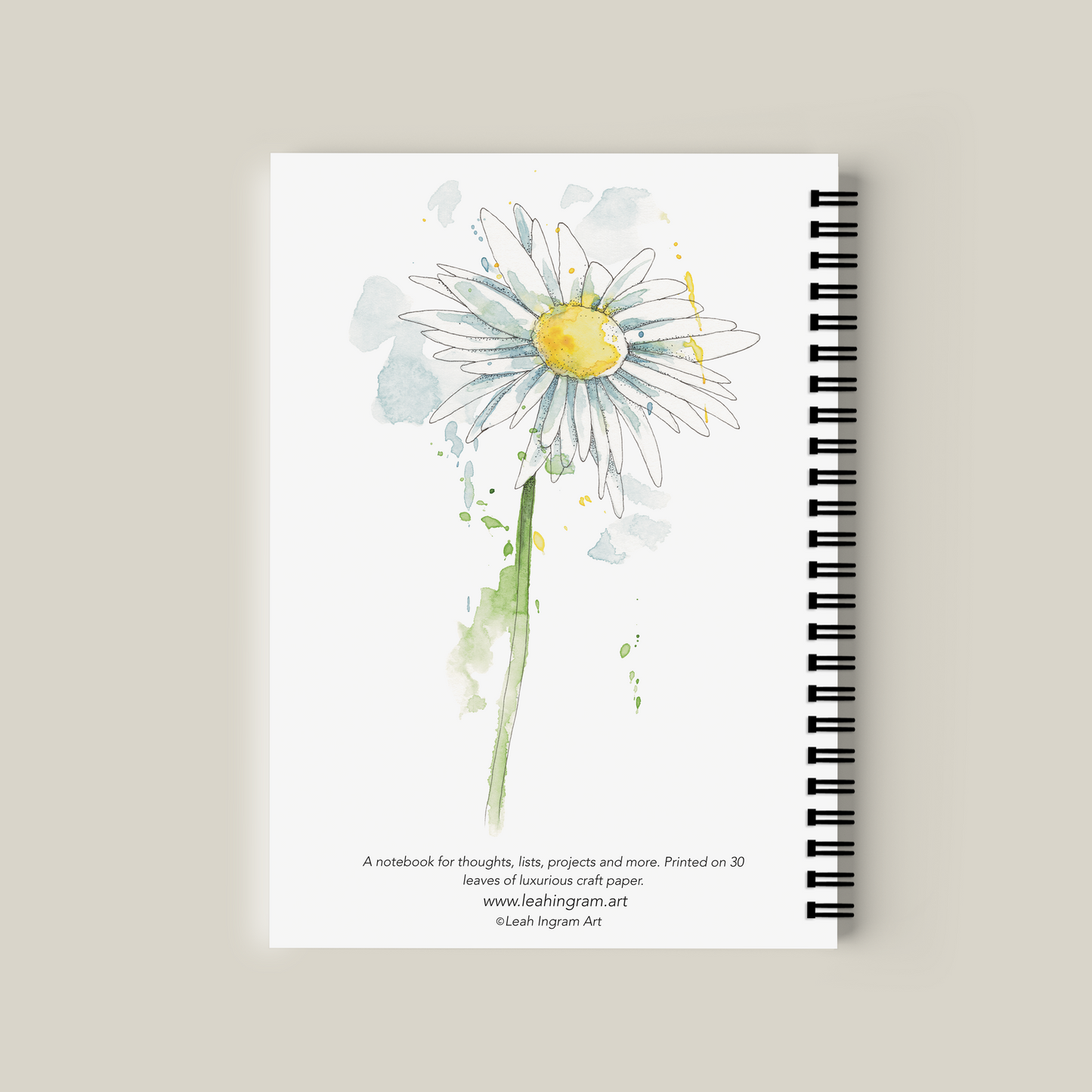 Notebook with a daisy illustration on a beige background