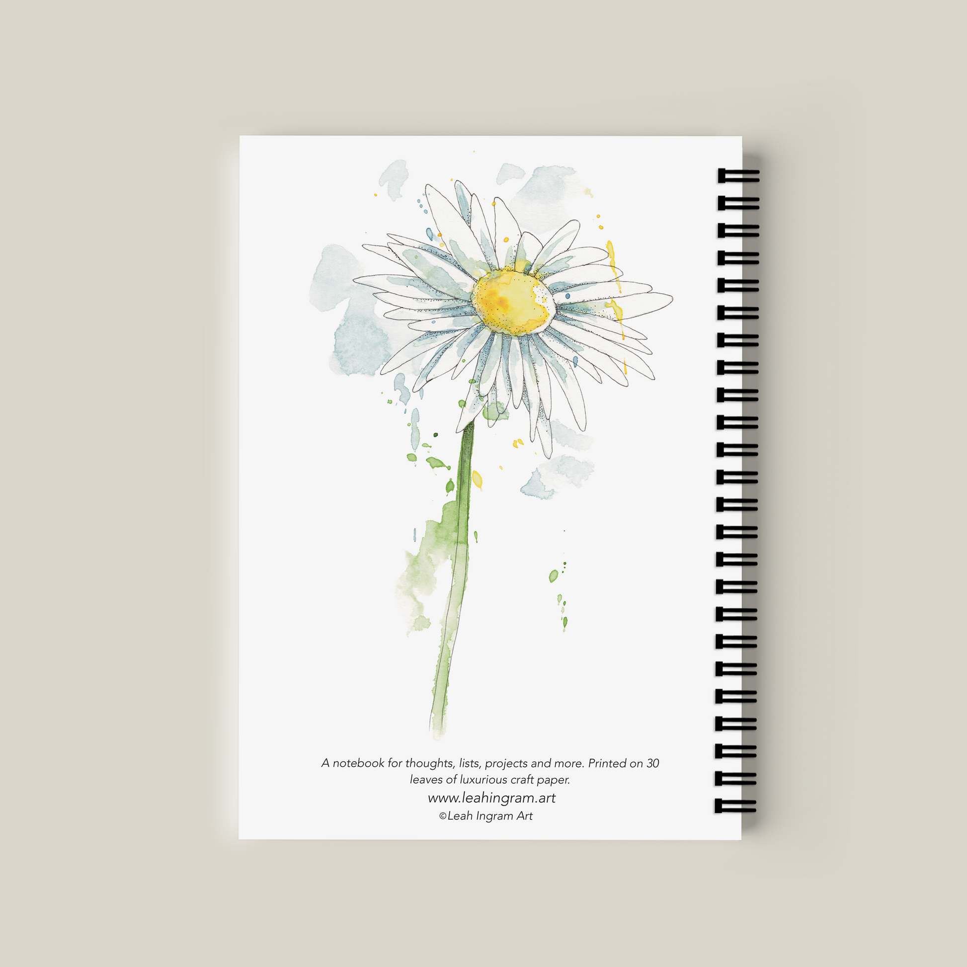 Notebook with a daisy illustration on a beige background