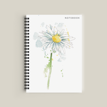 Notebook with a daisy design on a beige background