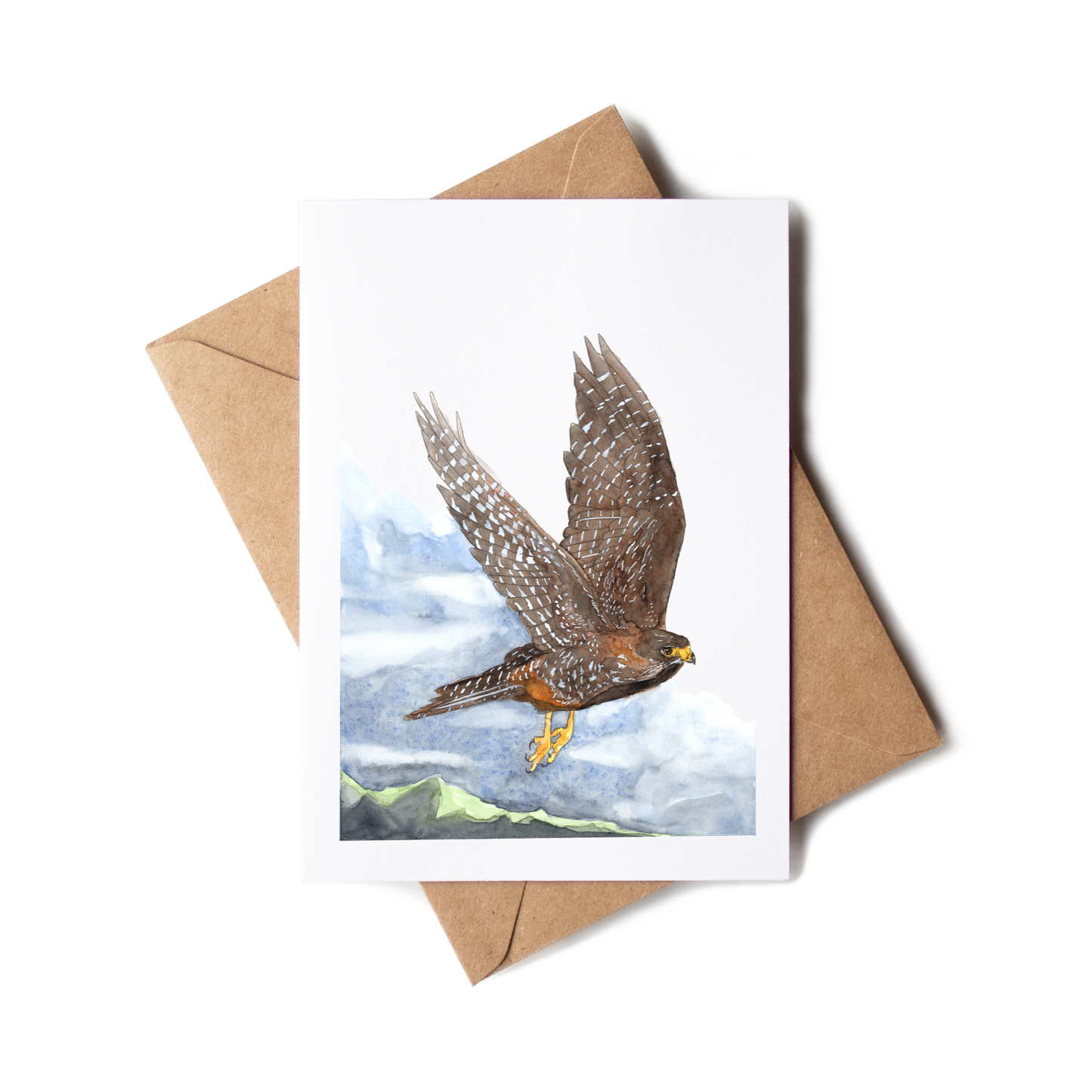 Greeting card with a falcon illustration on a white background with a brown envelope.