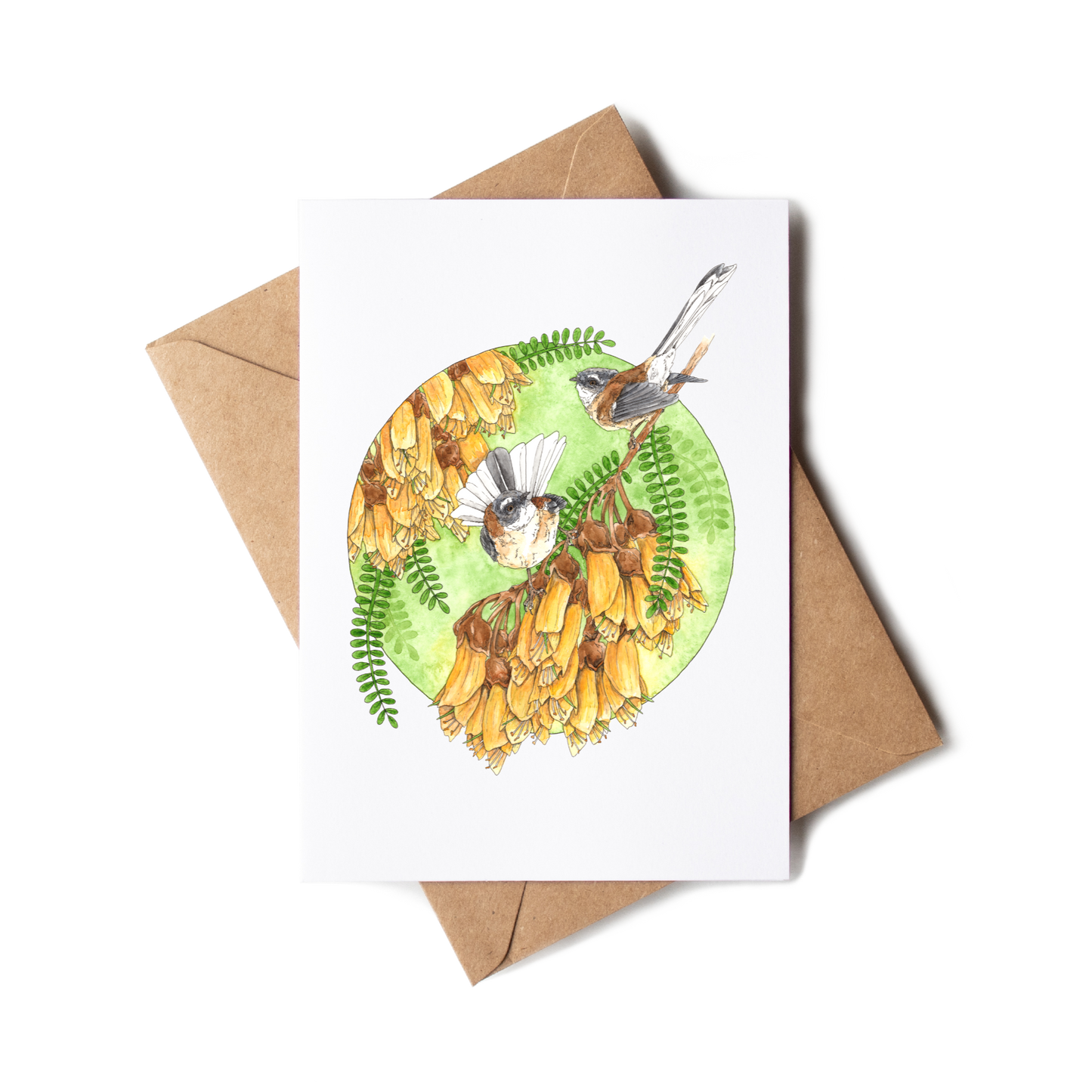 Greeting card with nature-themed design and envelope on a white background