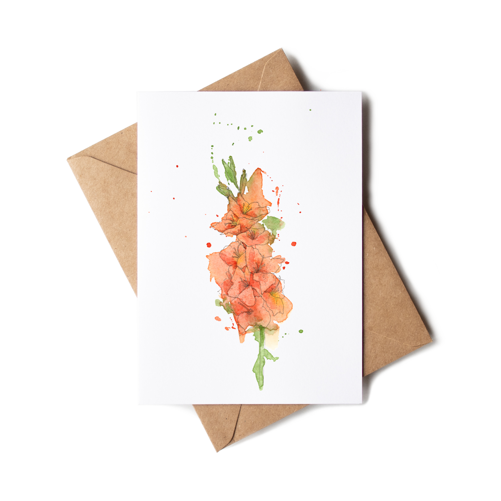 Greeting card with floral design and brown envelope on white background