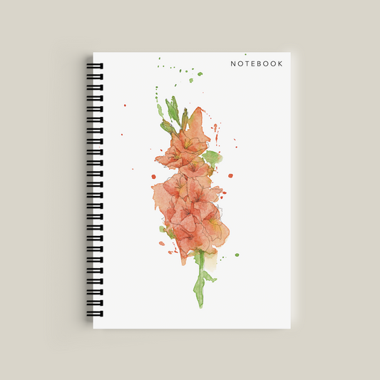 Notebook with floral design on a beige background