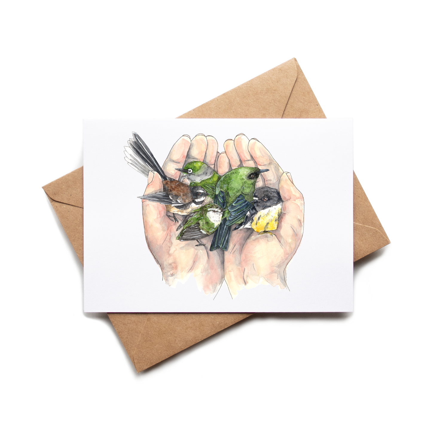 Card with illustration of hands holding birds on a white background with a brown envelope.