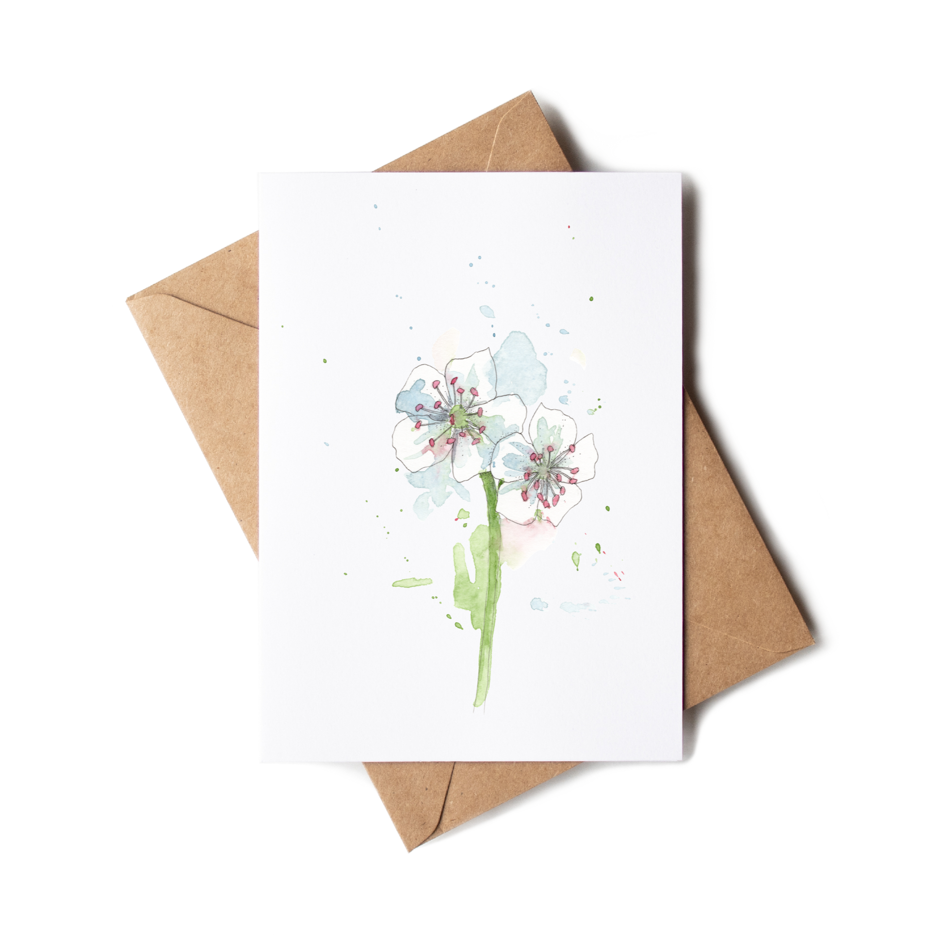Greeting card with floral design and brown envelope on white background