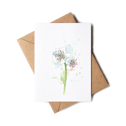 Greeting card with floral design and brown envelope on white background