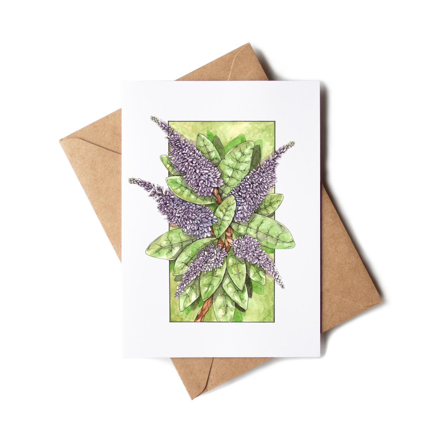 Greeting card with lavender design and brown envelope on white background