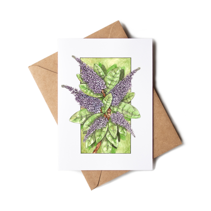 Greeting card with lavender design and brown envelope on white background