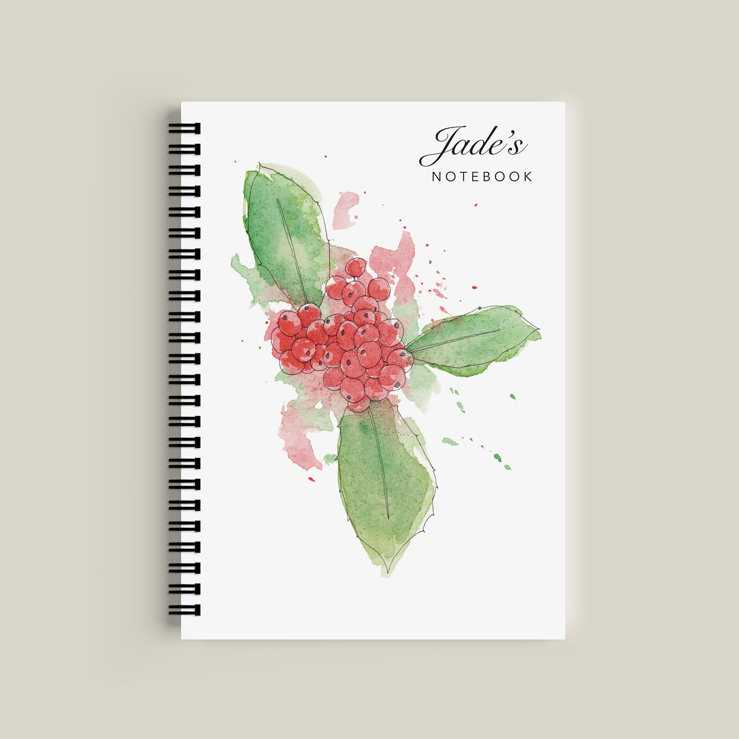 Notebook with floral design and 'Jade's Notebook' text on a beige background