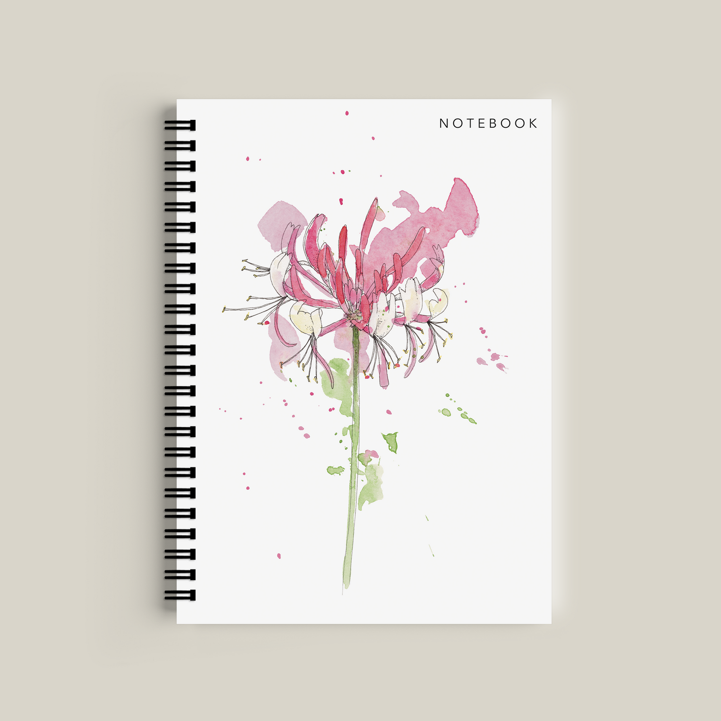 Notebook with floral design on a beige background