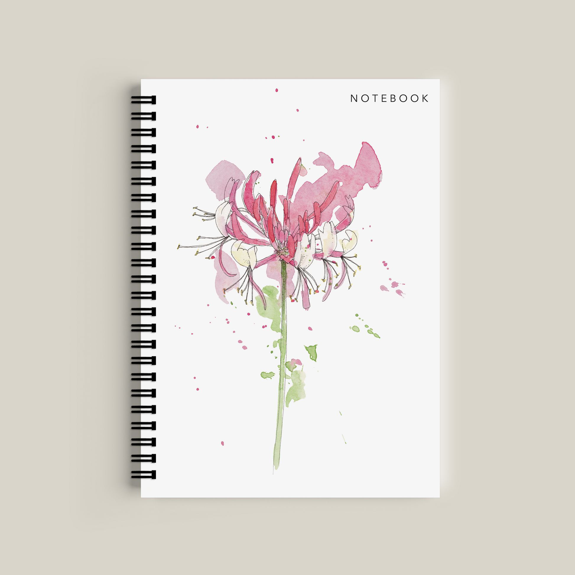 Notebook with floral design on a beige background