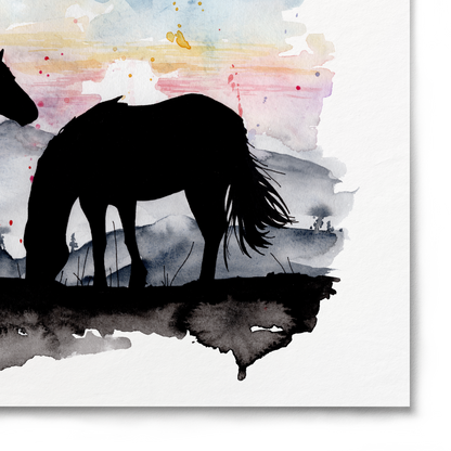 Silhouettes of two horses against a watercolor landscape with a sunset.