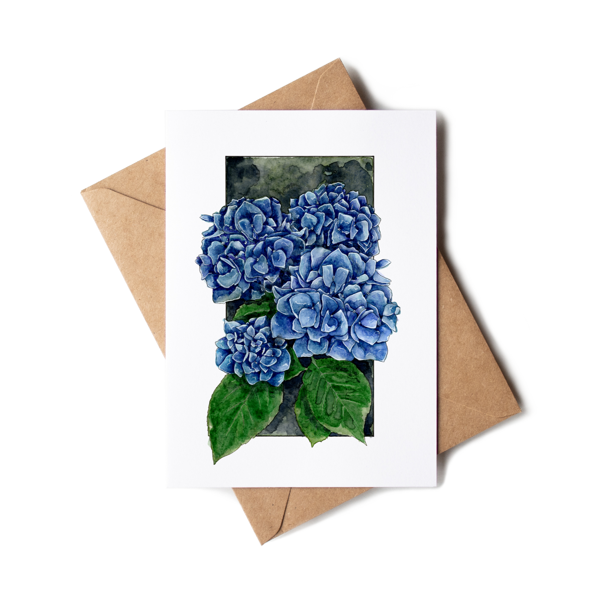 Greeting card with blue hydrangea flowers and a brown envelope on a white background