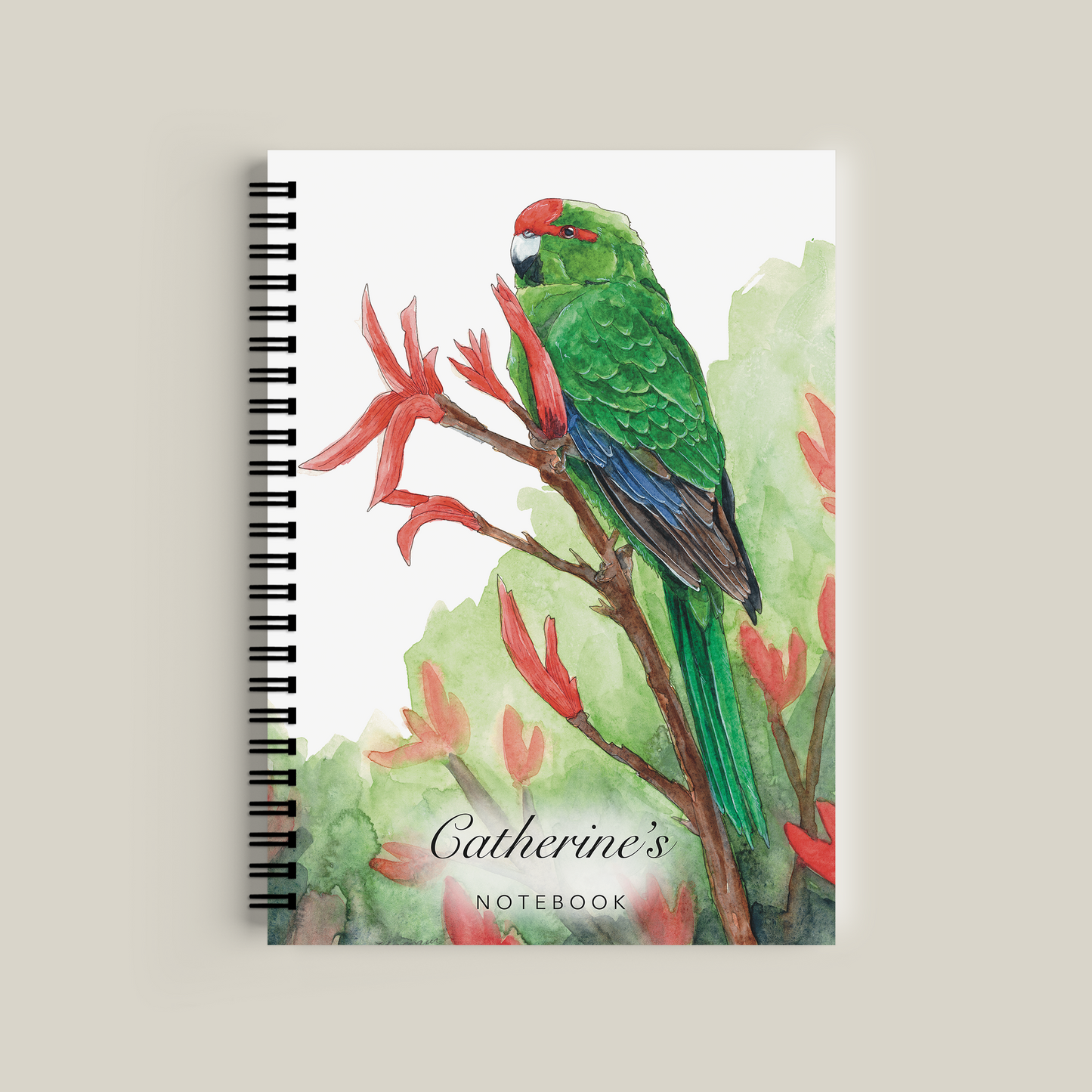 Notebook with a green parrot illustration on a beige background