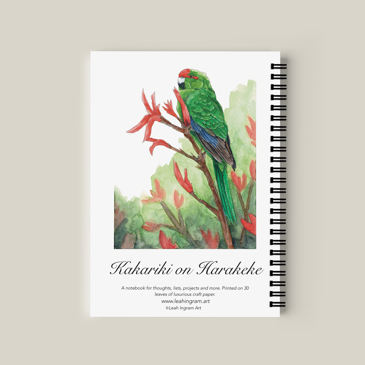 Notebook with a parrot illustration on a beige background