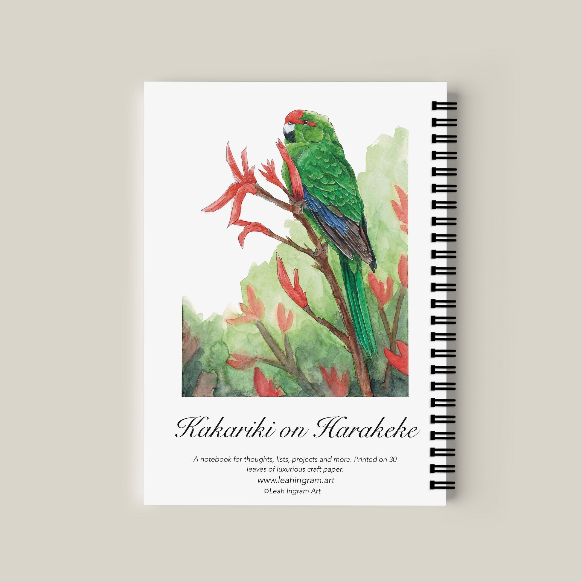 Notebook with a parrot illustration on a beige background