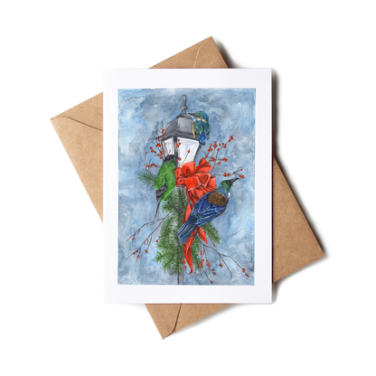Greeting card with a bird and festive elements on a white background