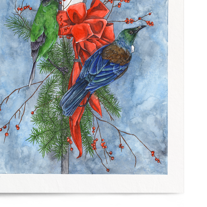 Framed artwork of two birds perched on a lamp post with a red bow, against a blue watercolor background.