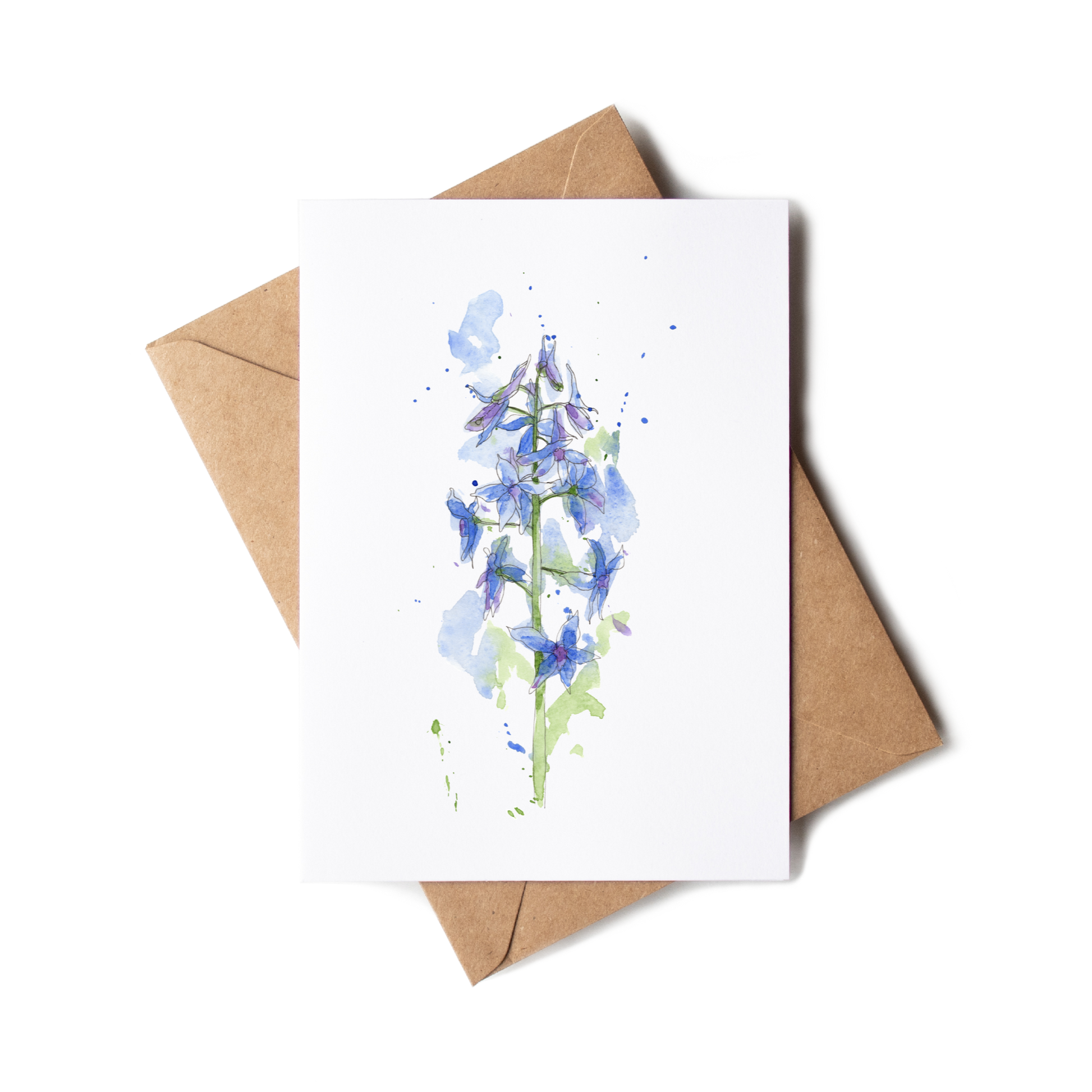 Greeting card with blue floral design and brown envelope on white background