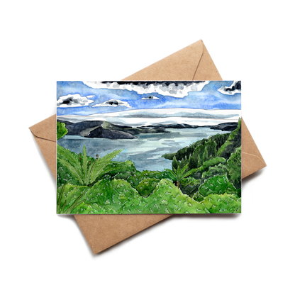 Greeting card with a scenic landscape illustration on a brown envelope