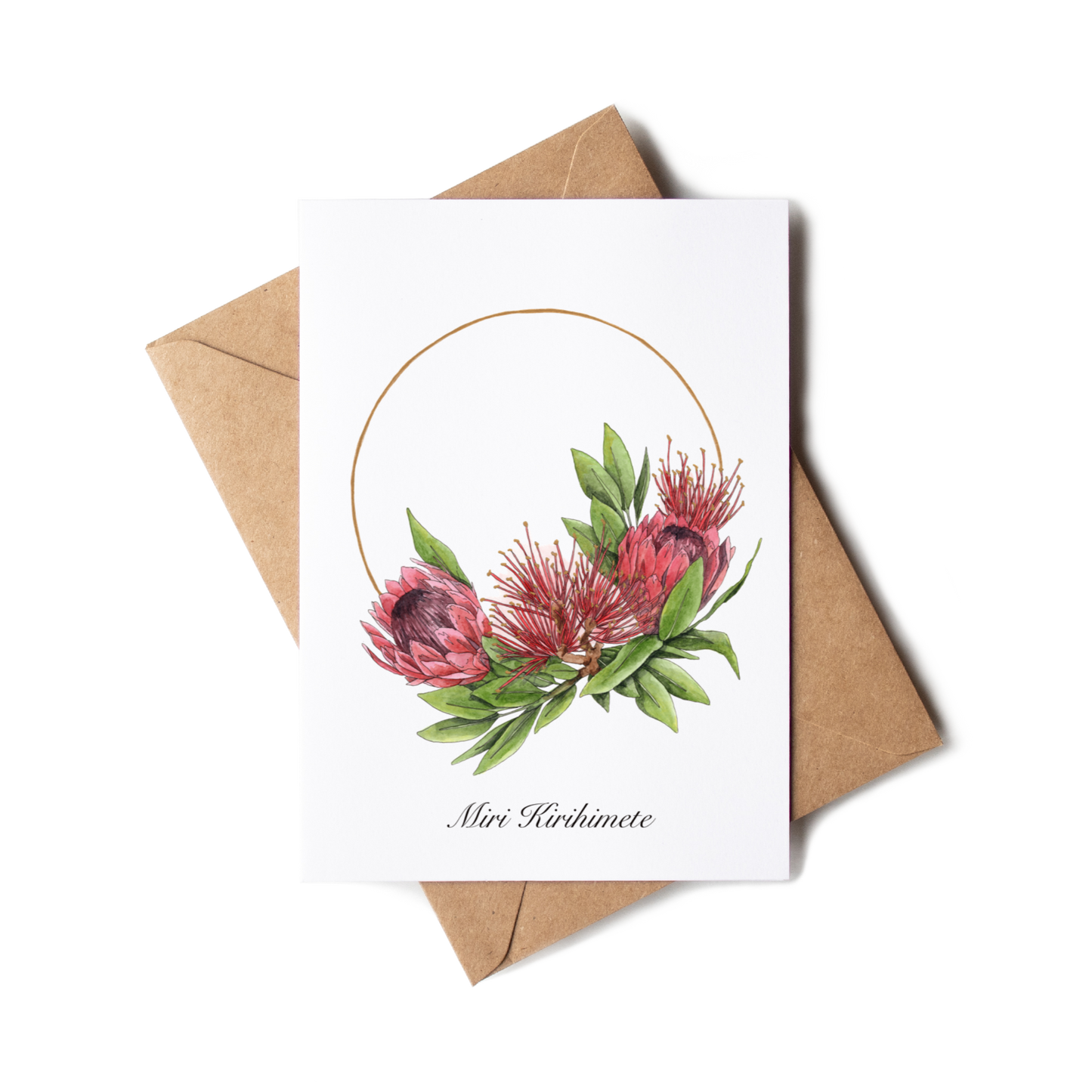 Greeting card with floral design and brown envelope on white background