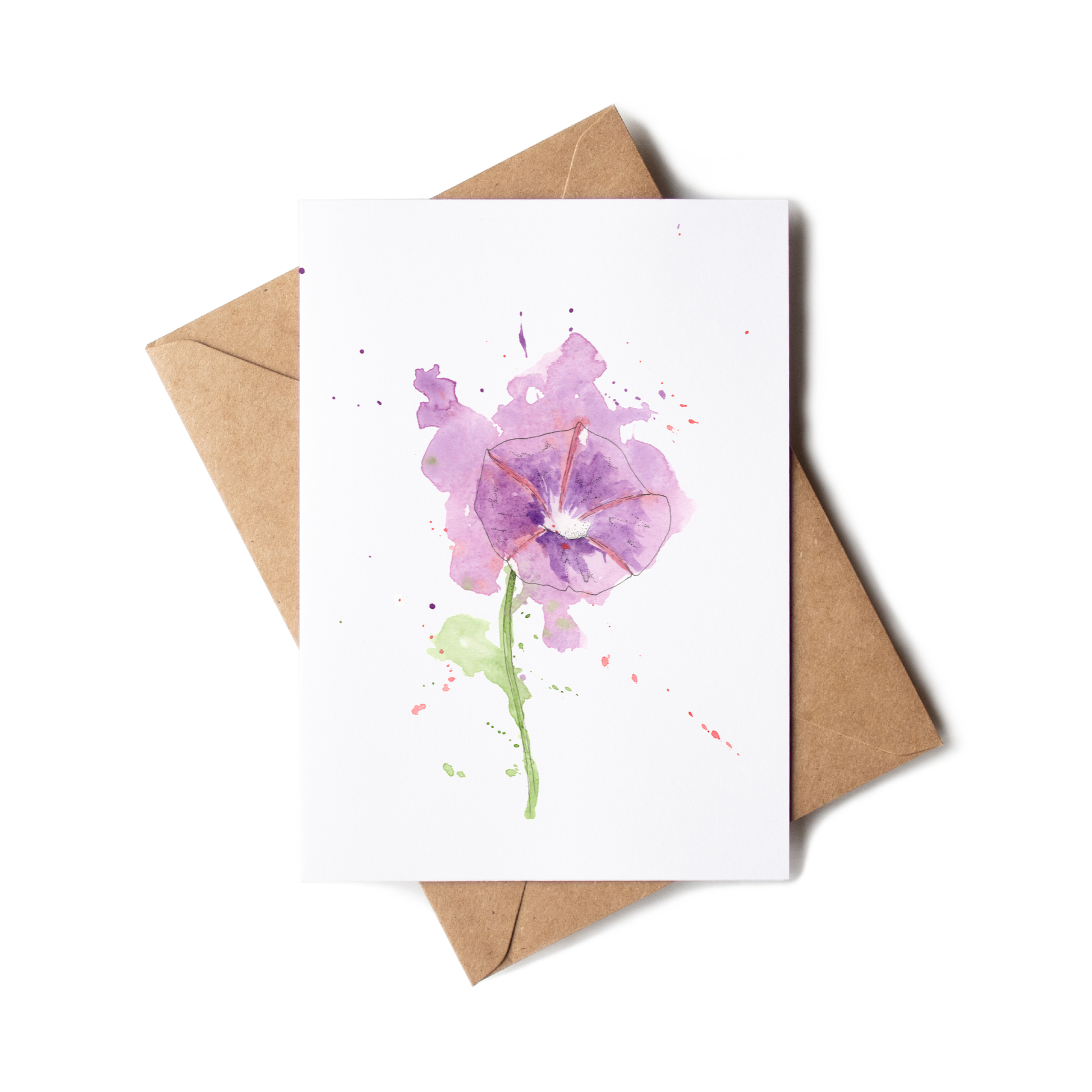 Greeting card with watercolor floral design and brown envelope on white background