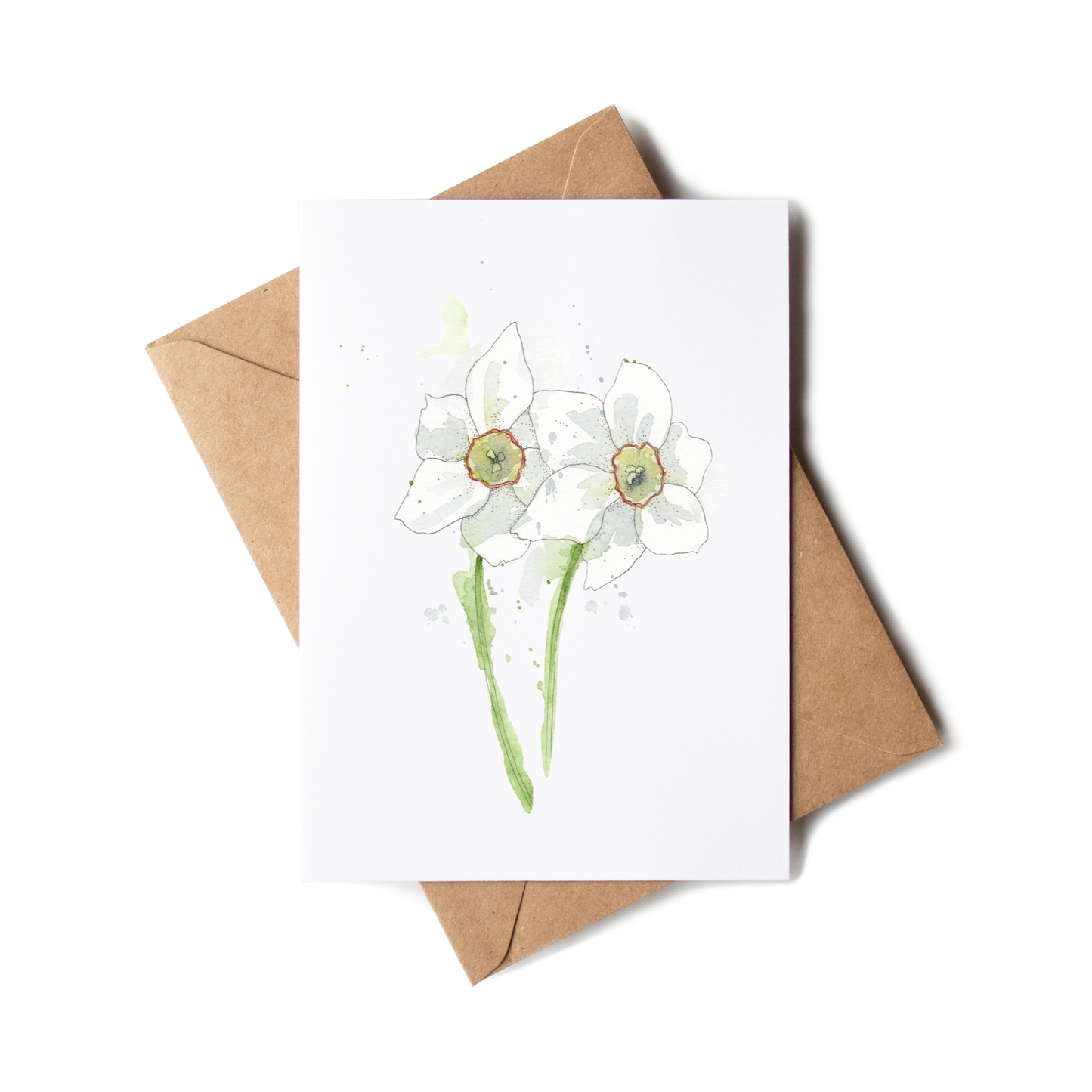 Greeting card with floral design and brown envelope on white background