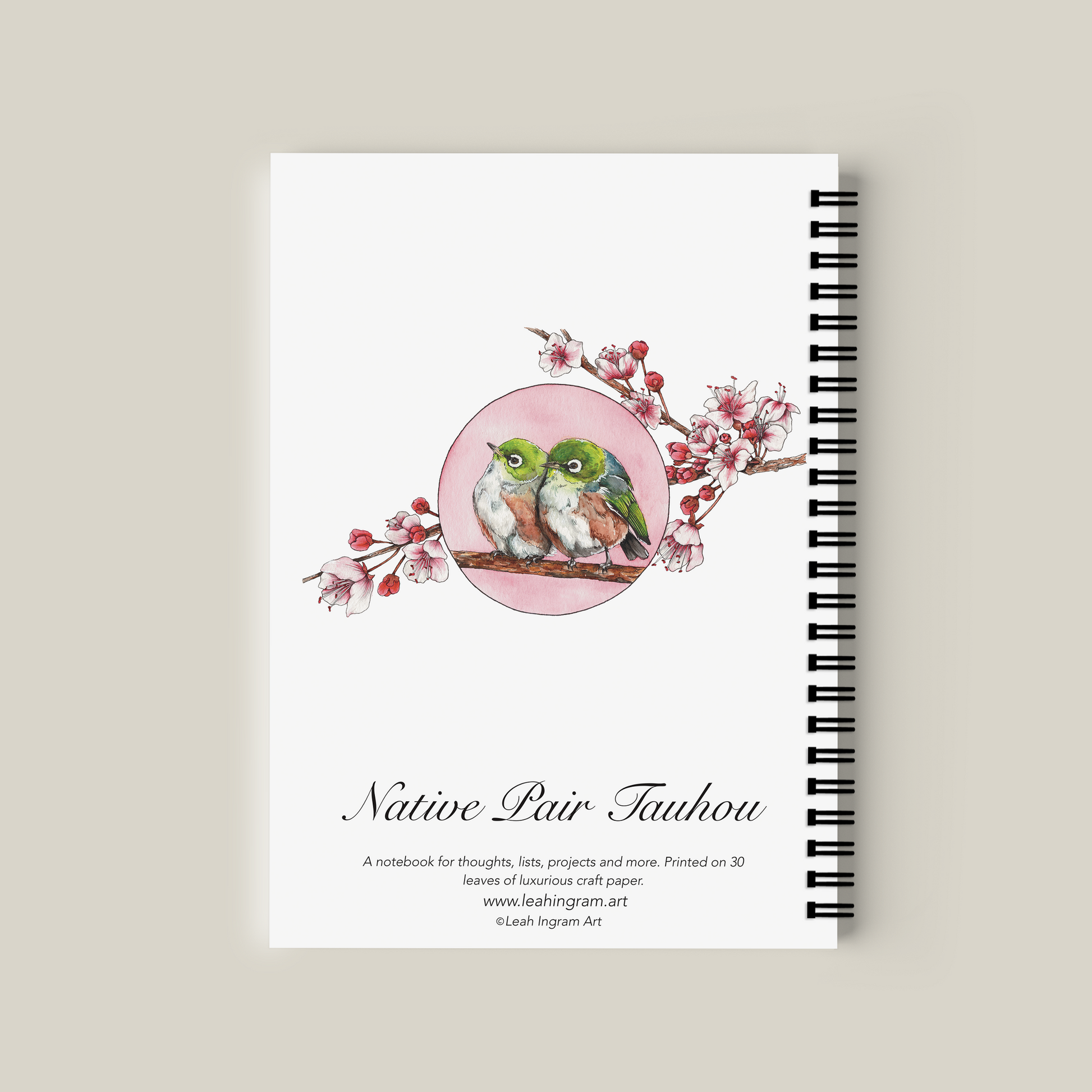 Notebook with bird illustration on a beige background